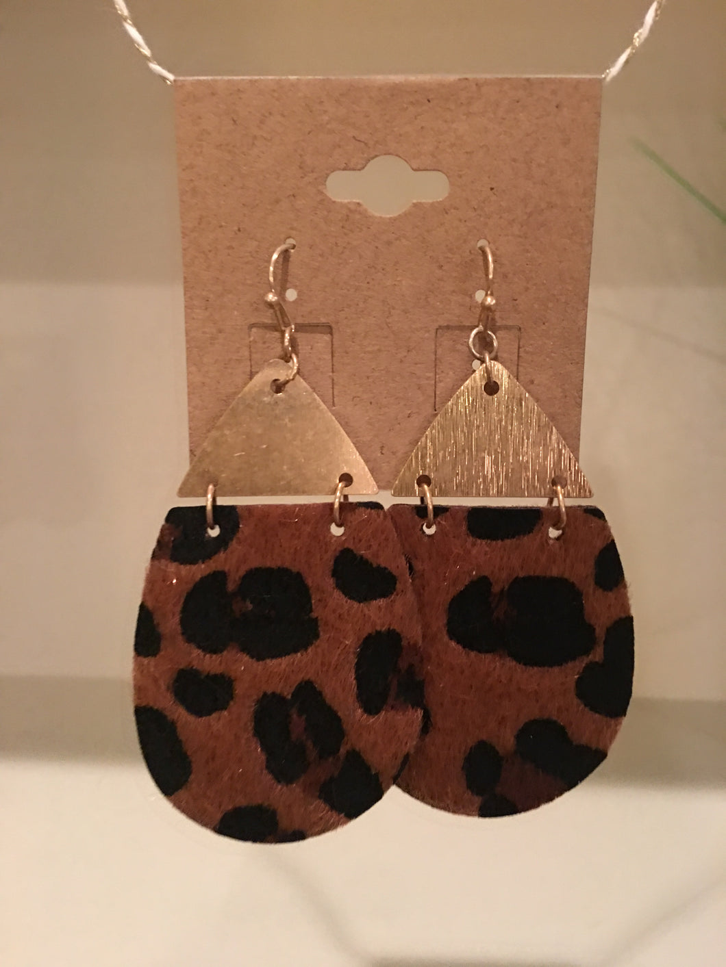 Leopard print earrings with gold accent